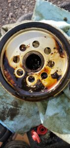 Sludgy Oil and Used Filter | Importance of Oil Changes in Denver | AutoFordable Mobile Mechanics