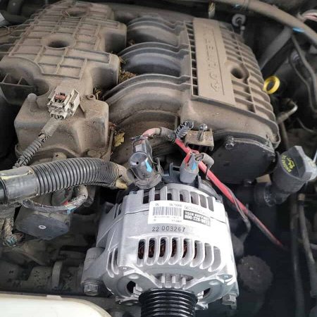Automobile engine with new alternator installed, showing expert mobile mechanic repair services at AutoFordable.